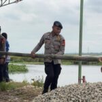 Satuan Brimob PMJ Mulai Bangun Jembatan Merah Putih Presisi di Pebayuran Bekasi